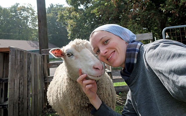 Vision 2025 Gonçalves 5 What a flock of sheep taught its shepherdess Sister Lily Key, O.C.S.O. poses with Ella, who is considered the diva of the flock.